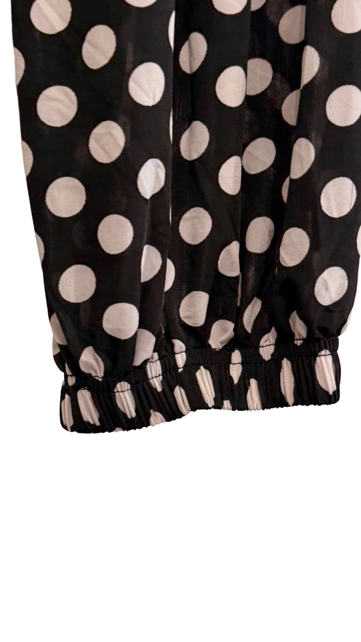 Pantalon ballon noir à pois blancs à taille et chevilles élastiquées