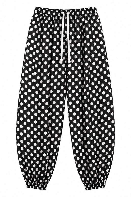 Pantalon ballon noir à pois blancs à taille et chevilles élastiquées