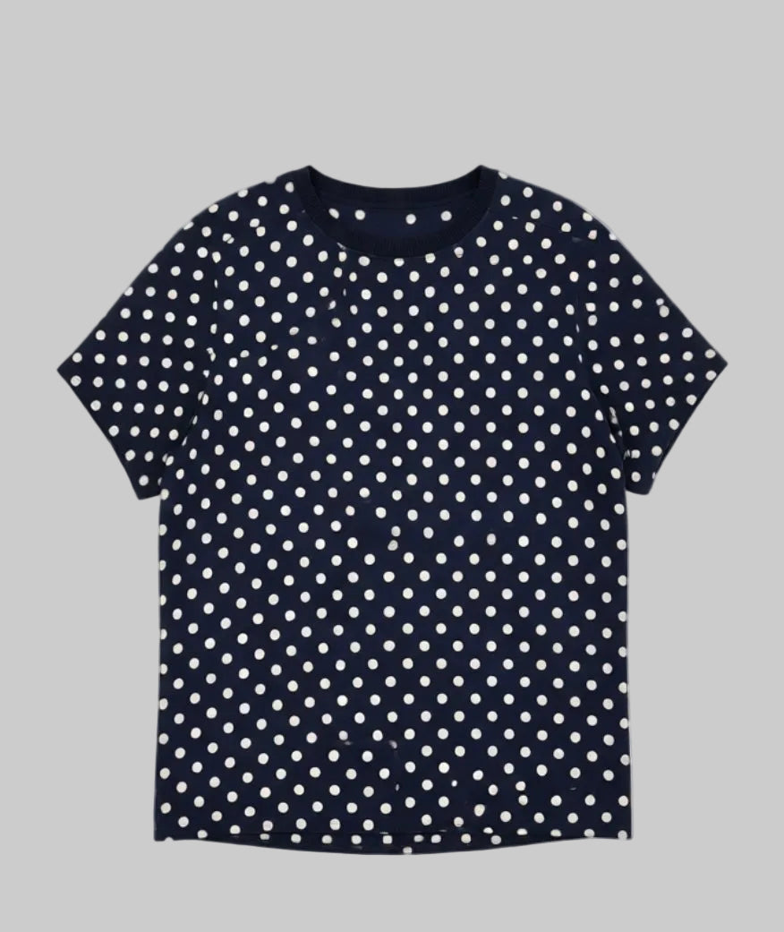 Haut fluide bleu marine à pois blancs