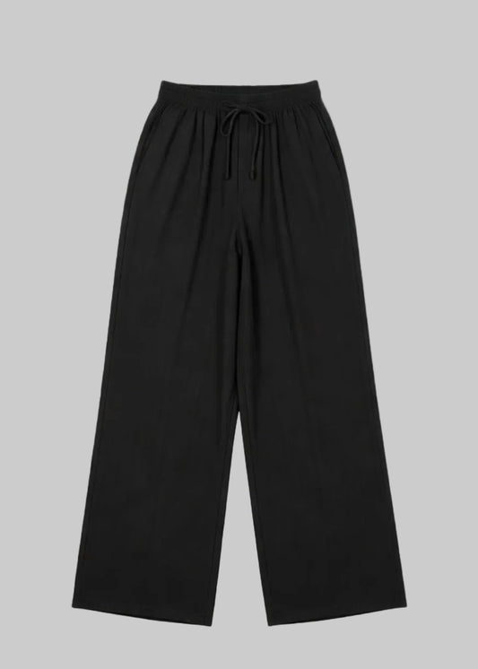 Pantalon fluide large noir à taille élastique et lien de serrage