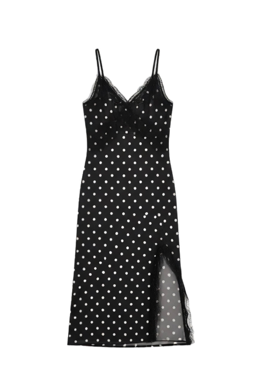 Robe longue fluide noire à pois blancs et finitions dentelle