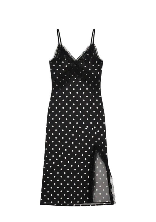 Robe longue fluide noire à pois blancs et finitions dentelle